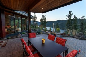 Lake Fernan Residence - Passive House Institute Certified Outdoor patio with serene lake and forest view