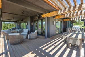 Spacious patio with outdoor seating and dining table