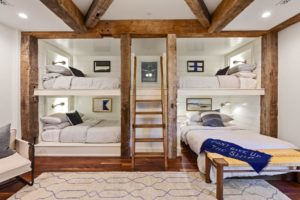 Cozy rustic bedroom with wooden bunk beds
