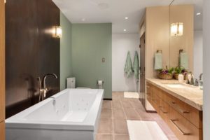 Modern bathroom with tub and vanity