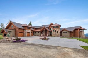 Harrison Residence #1 Spacious rustic home with stone and wood design.
