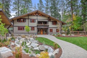 Hayden Lake Chalet Rustic cabin amid lush forest setting