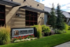 Modern construction office exterior with landscaping