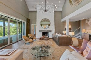 Stylish living room with modern decor and fireplace.