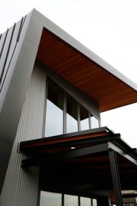 Modern building with sleek, angular architecture.