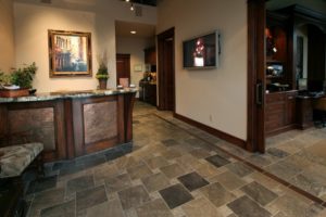 Elegant Office Reception Area with Art and TV