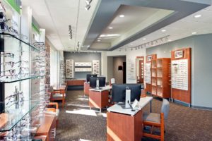 Ellenbecker Eye Clinic Modern eyeglass store interior with displays and desks.