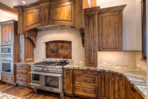 Harrison Residence #1 Wood kitchen cabinets with stainless steel stove