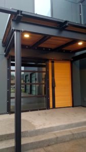 Modern Wooden Door with Black Metal Frame Entrance