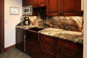 Elegant kitchen with granite countertops.