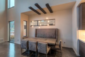 Modern dining area with sleek furniture.