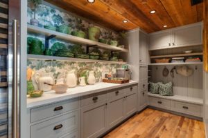 Stylish rustic kitchen with green decor