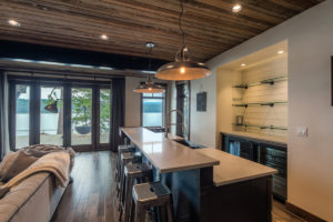 Modern kitchen with scenic lake view.