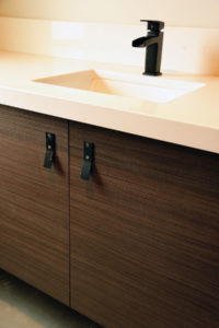 Modern bathroom sink and cabinet design.