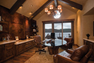 Luxurious home office with lake view.