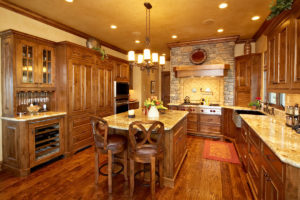 Elegant rustic kitchen with wood cabinets and island.
