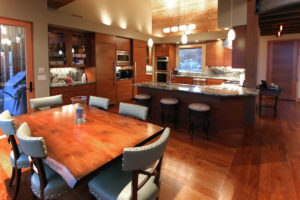 Modern kitchen and dining area with wooden decor