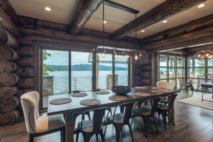 Rustic dining room with lake view.