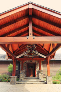 Rustic wooden porch with stone accents