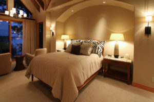 Cozy bedroom with elegant lighting and decor