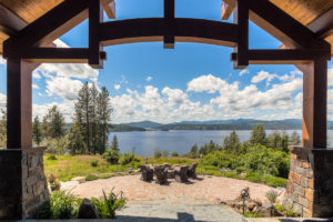 Lake view from porch with patio and trees