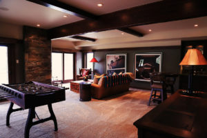 Cozy game room with sofa and foosball table