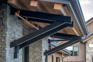 Modern architectural beams and stone wall facade