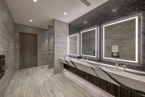 Modern restroom with elegant mirrors and sinks