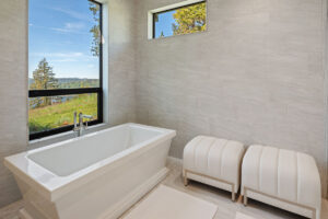 Black Rock Residence #6 Modern bathroom with scenic window view