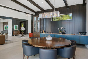 Black Rock Residence #6 Modern dining room with elegant chandelier.