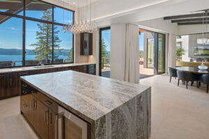 Black Rock Residence #6 Modern kitchen with island and lake view.