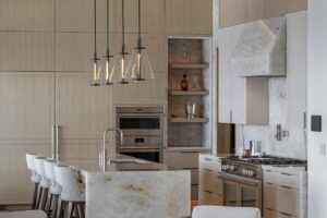 Black Rock Residence #7 Butler's pantry and secondary kitchen with a natural stone hood surround and professional range