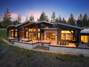 Modern home with stunning views at sunset.